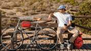 Red SKIMP Adventurer backpack on a cycling trip