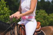 Light pink SKIMP Originale belt worn on horseback