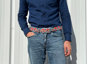 SKIMP Retro Geometric Belt worn with blue jeans and a navy shirt