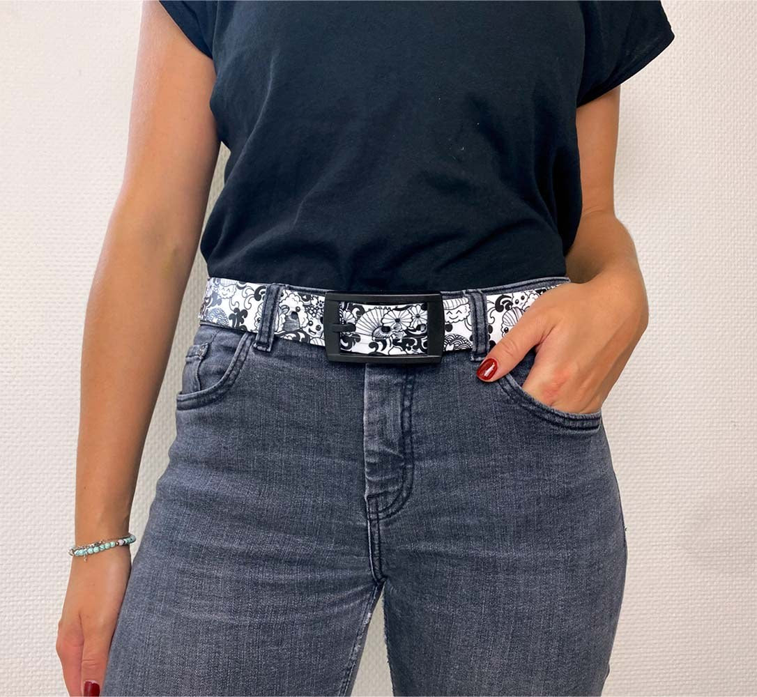 SKIMP Petite Lulu Sushi Mono Tokyo Bloom Belt with black buckle worn with grey jeans